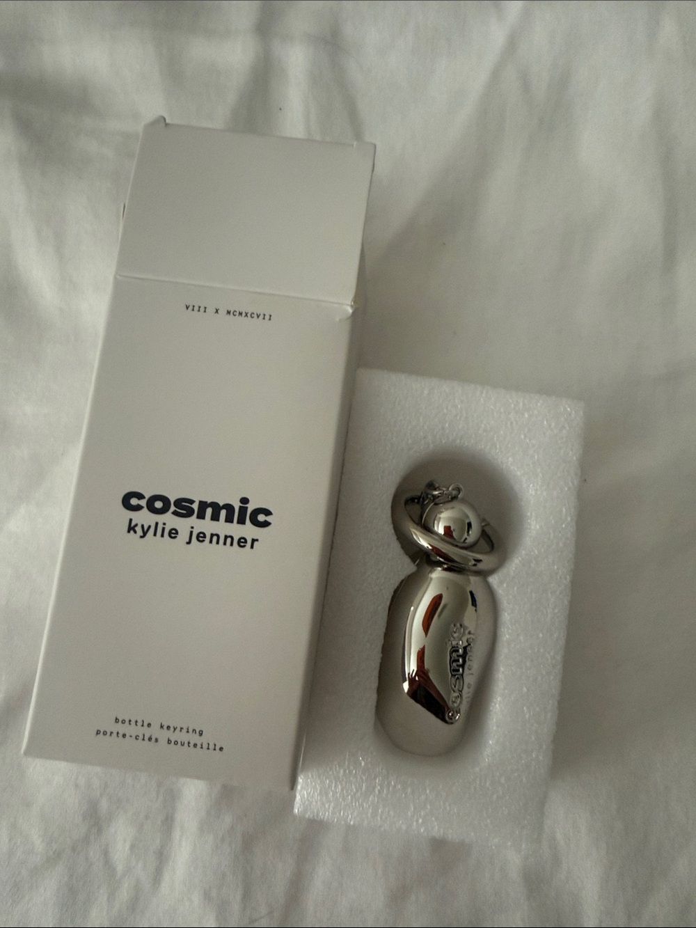 Kylie Jenner Cosmic Silver Bottle Keyring - Shiny Silver Accent